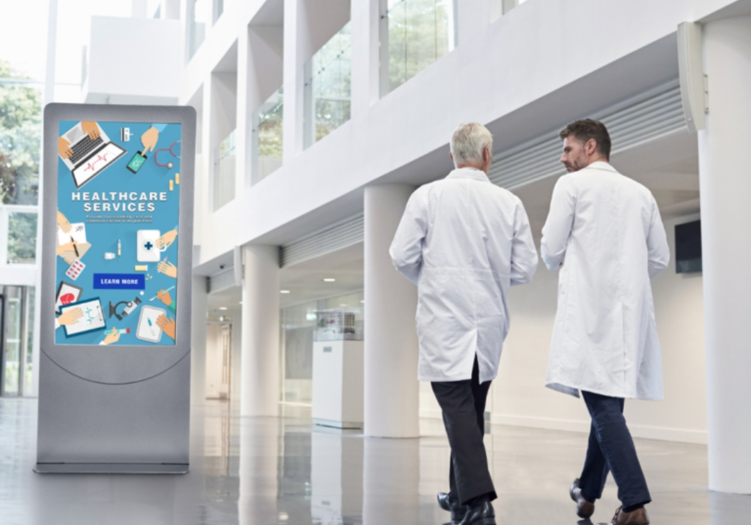 Peerless AV hospital kiosk for patient self-check-in and navigation. Great for healthcare av systems