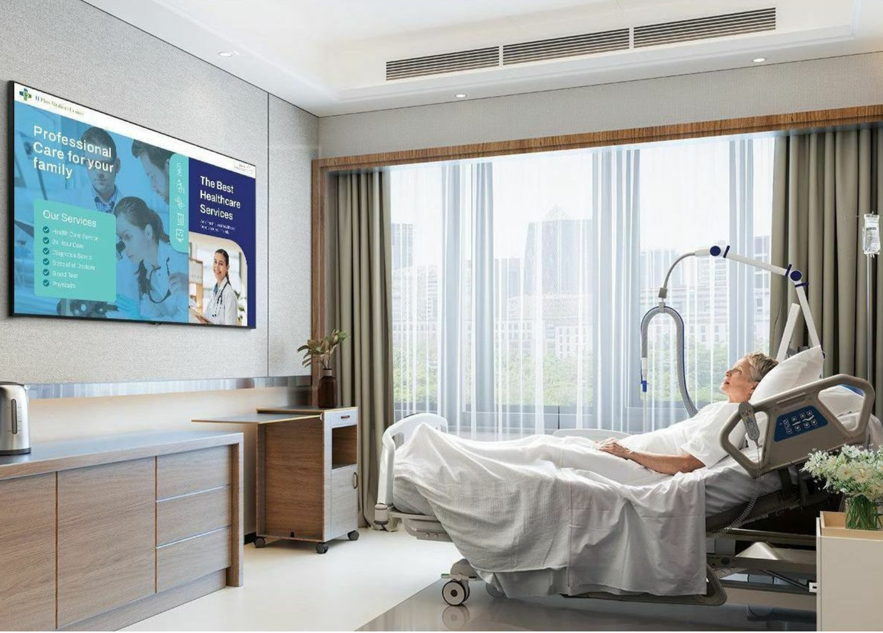 “High-end patient suite showcasing a wall-mounted screen powered by healthcare grade TV systems.”
