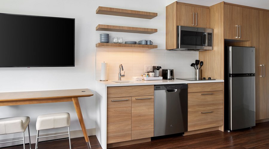 Hotel room featuring coordinated FF&E furniture and décor from national hotel suppliers.