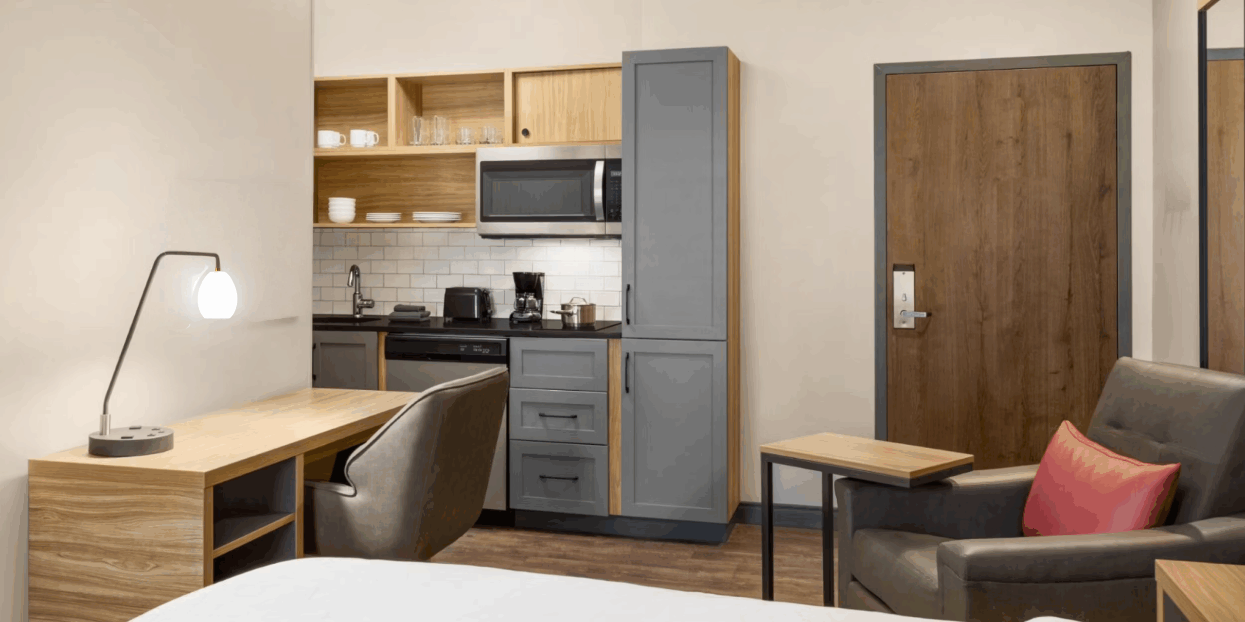 Guestroom refresh including hotel room microwaves and compact hotel refrigerators sourced through MDM Commercial.