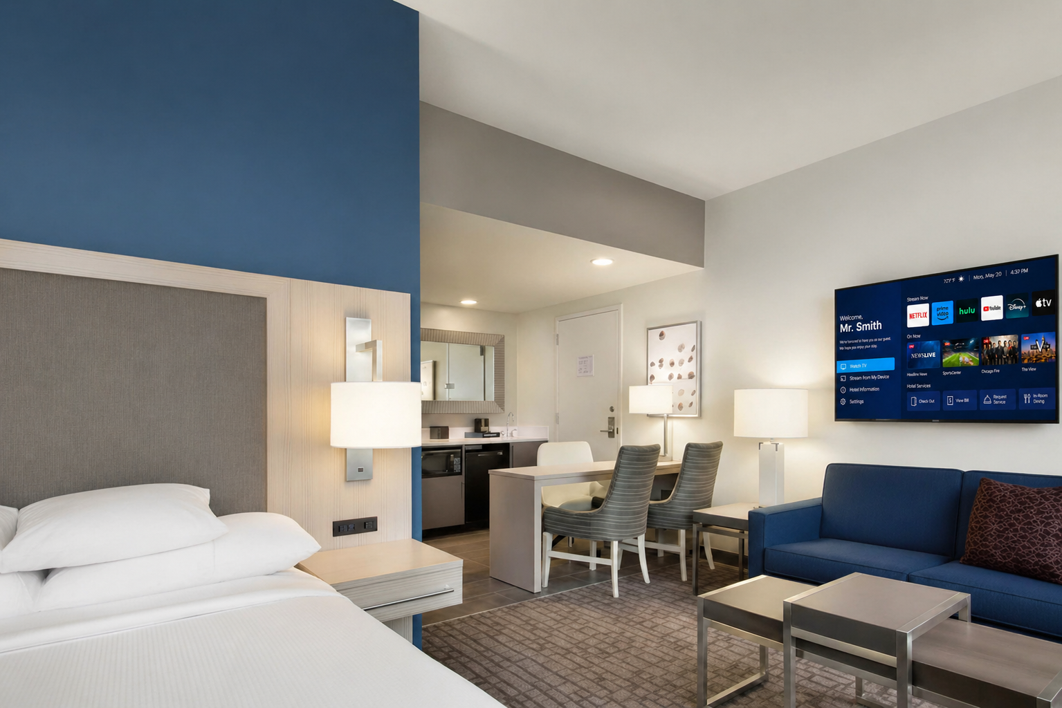LG hotel TVs for Embassy Suites by Hilton including large living room TV and bedroom hospitality television package