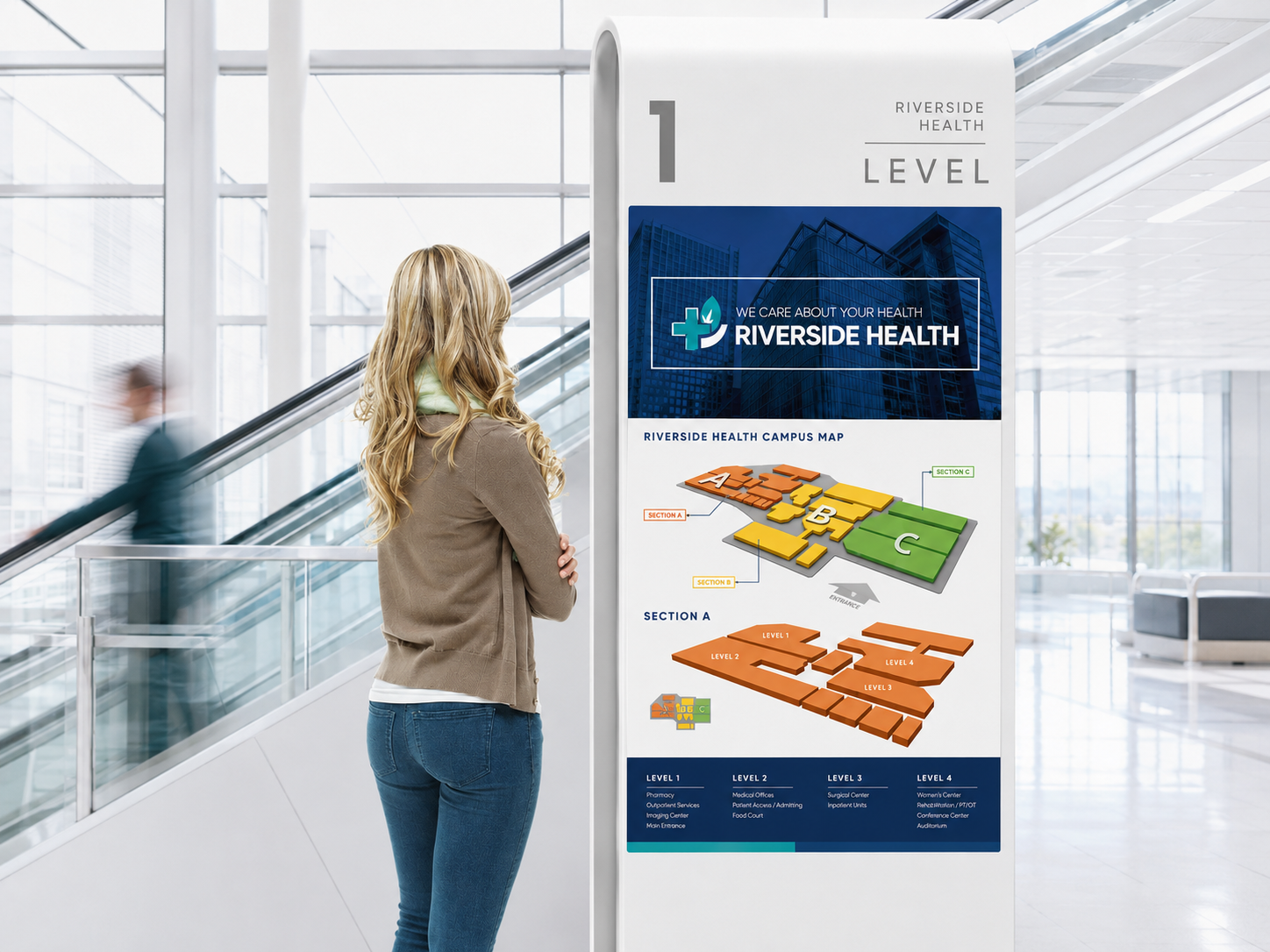 "LG commercial digital signage display in a modern hospital lobby showing wayfinding directory"