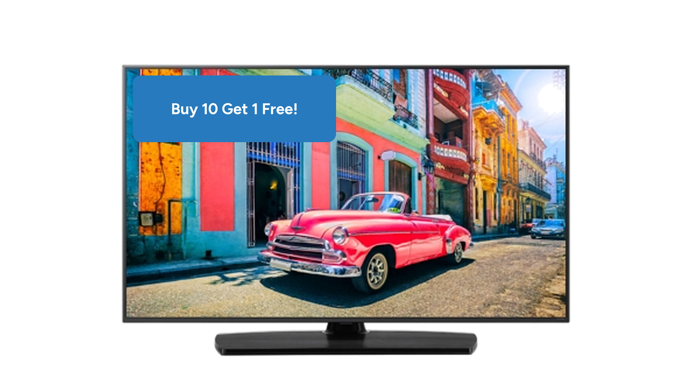 Hotel TV on a center stand with a "Buy 10 Get 1 Free!" badge, showing a pink vintage car on a colorful city street